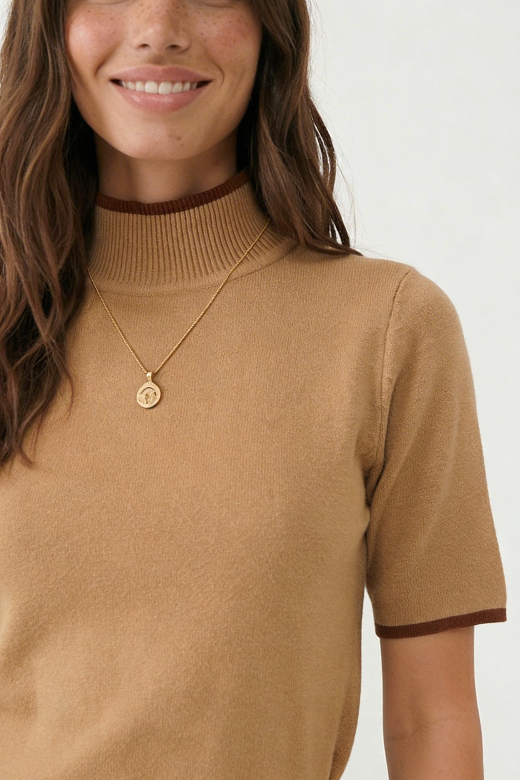 SN1606 - REMERA TEJIDA FUJI